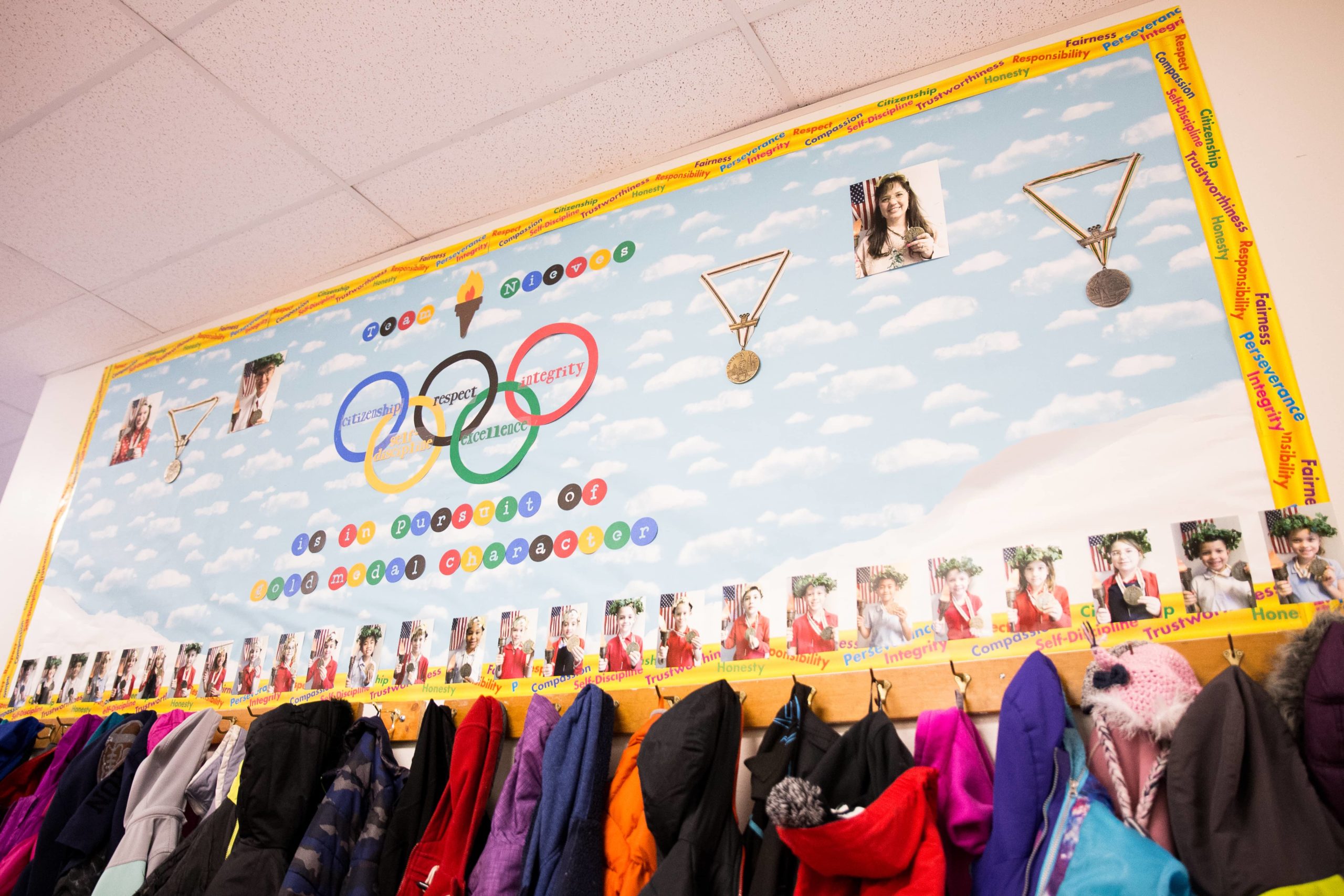 The inside of a Vanguard School classroom with coat hooks on the wall